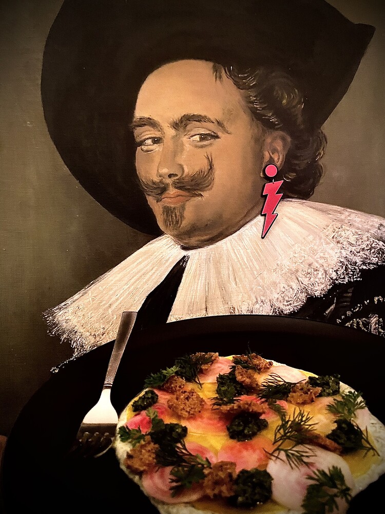 Ceviche served beneath a portrait painting at Lustre