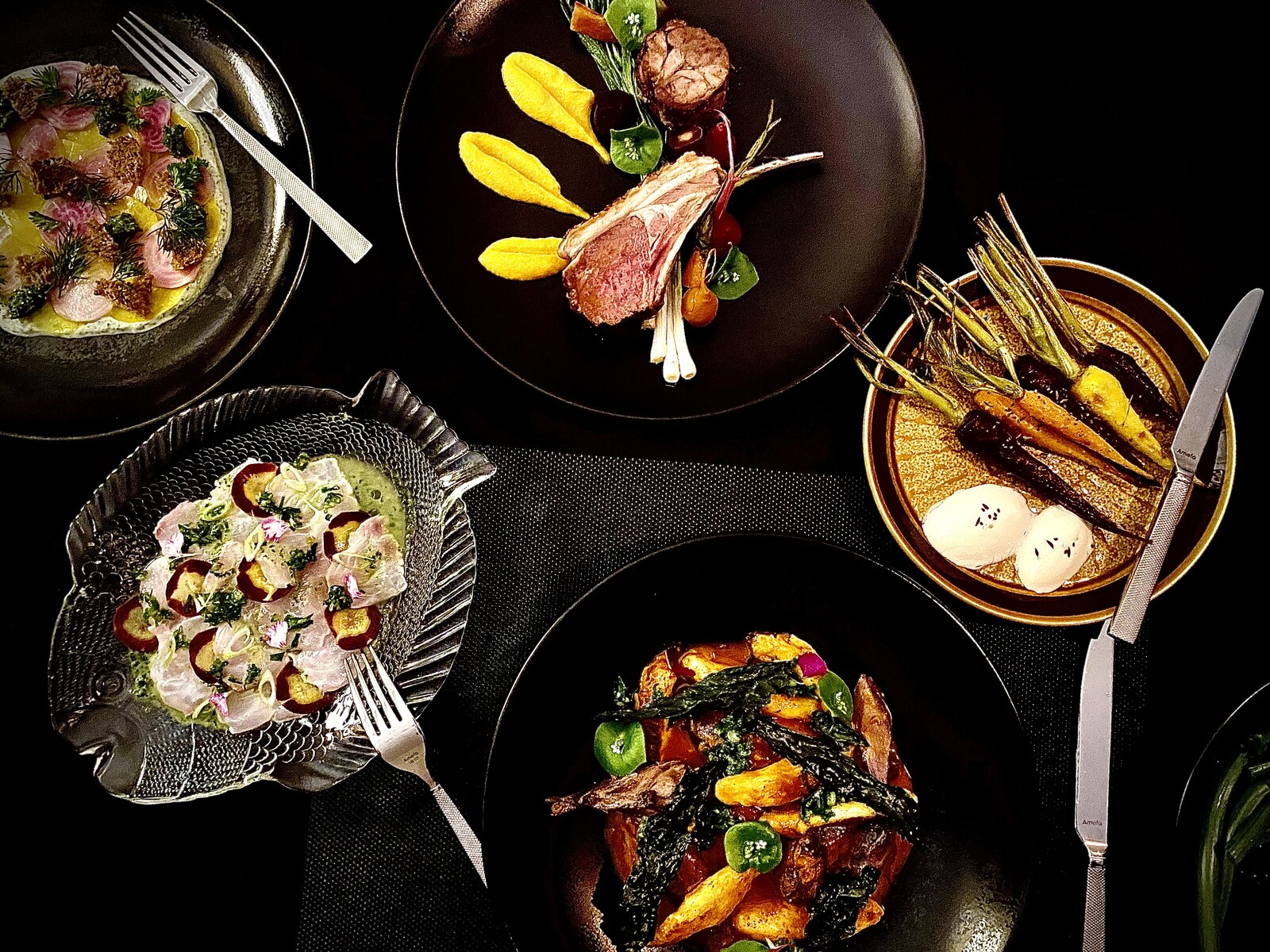 An overhead spread of Lustre dishes